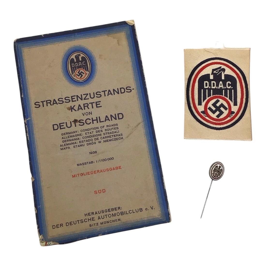 German D.D.A.C. Automobile Club Grouping | Stick Pin, BeVo Patch & 1939 Road Map | WW2 Grouping: This outstandingly fascinating German World War II Der Deutsche Automobil-Club (D.D.A.C.) grouping brings together three highly display-worthy period items: a BeVo-embroidered sleeve patch, a multi-co