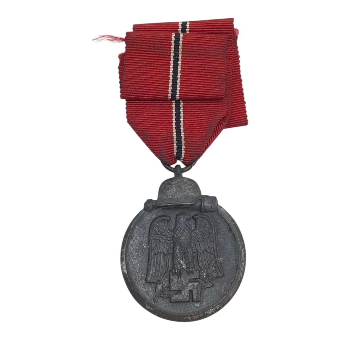 German WW2 Eastern Front Medal "Ostmedaille" Winter Campaign 1941-42: This original German WWII Eastern Front Medal, commonly known as the Ostmedaille or "Winter Battle in the East 1941-42 Medal," was instituted on May 26, 1942. The medal was awarded to German and Axis