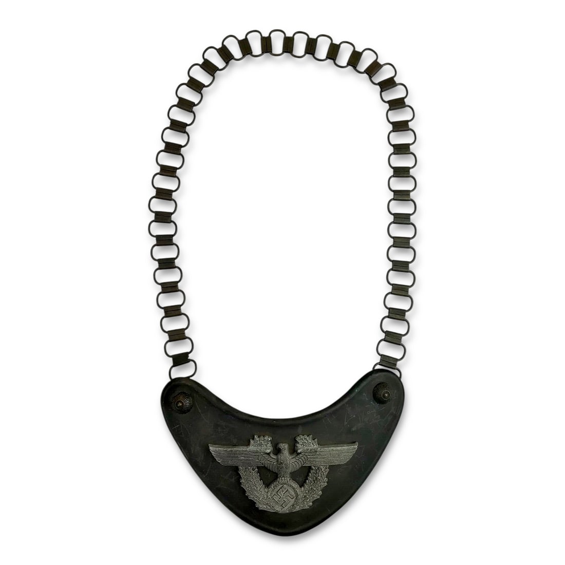 German Wehrmacht Police Gorget with Chain - Marked "L" - WW2 German Police: This original German WW2 Police Gorget Breastplate features a metallic front with the central eagle and swastika emblem, showcasing a rich aged patina. The gorget retains its complete suspension neck