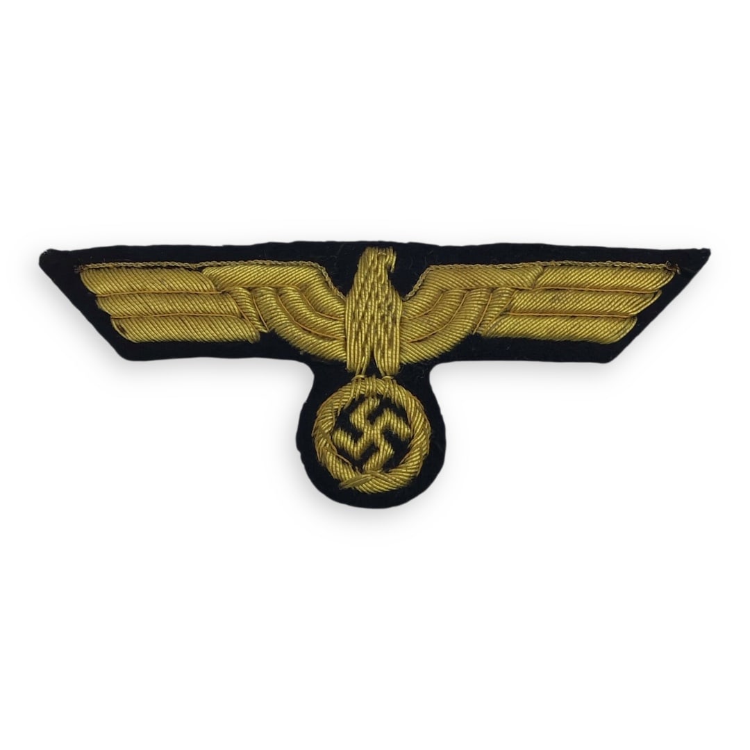 German Kriegsmarine Breast Eagle - Gold Bullion for Navy Tunic - WW2: This is a beautiful example of a WWII-era Kriegsmarine gold bullion breast eagle worn on officer's navy-blue dress and duty tunics. The eagle is crisply hand-embroidered in golden-yellow thread, with