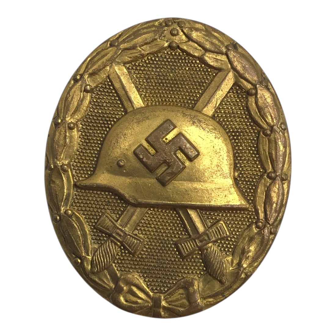 German WW2 Award Gold Wound Badge - Solid Construction: This authentic German WWII Gold Wound Badge is a solid, die-struck example displaying correct form, weight, and construction. The obverse retains strong detail to the helmet, crossed swords, and laure