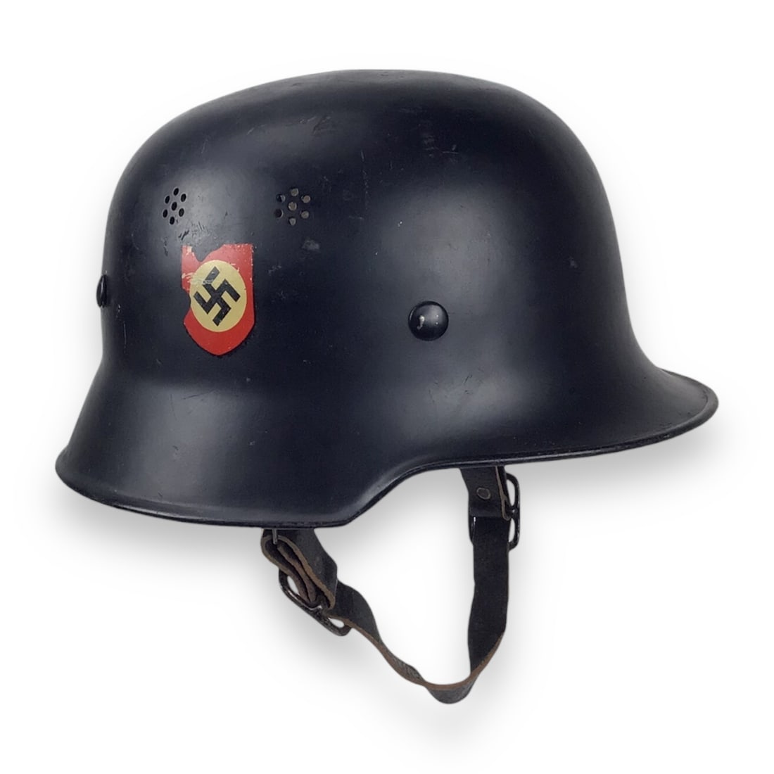 German M34 Stahlhelm Fire (Civil) Police Steel Helmet with Police Decal - WW2: This German WW2 M34 Fire (Civil) Police Helmet features a 90% intact police eagle decal on the left side and an 80% intact swastika party shield on the right side. Issued to members of the Feuers