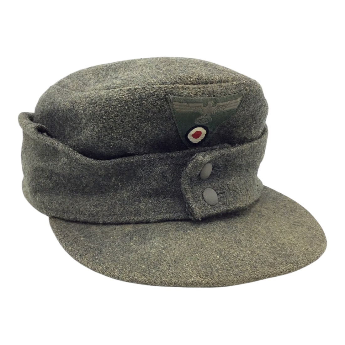 Mint German WW2 Heer M43 Field Cap Made from Italian Wool Dated 1944: This outstanding German WW2 Heer M43 field cap is a textbook example produced from Italian ski-grey wool and retains its original German WWII trapezoid insignia. The cap is clearly maker marked and da