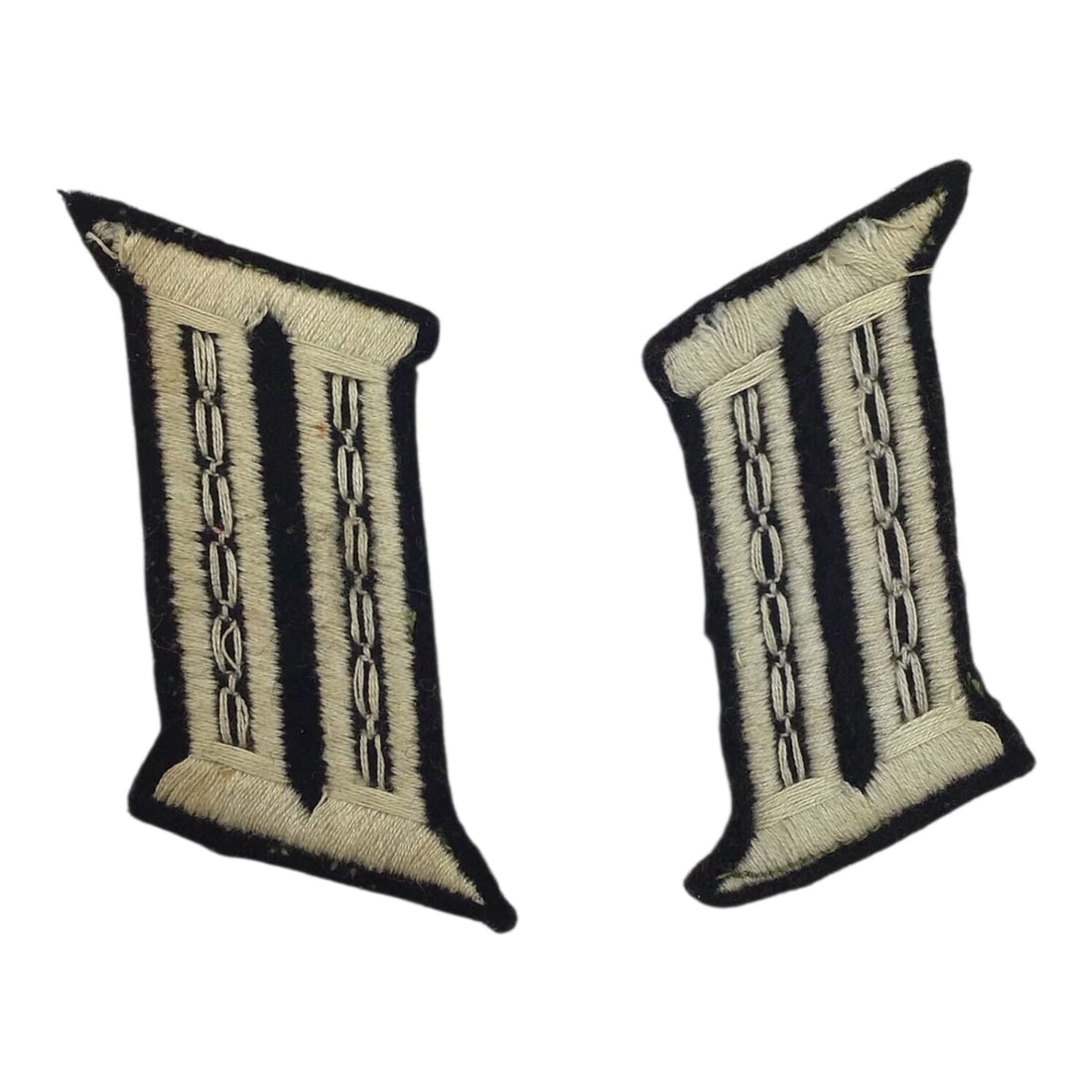 Rare German SS Pioneer EM/NCO Collar Tab Matching Set: This scarce matching set of German WWII SS Pioneer EM/NCO collar tabs was produced for wear on field combat uniforms and features high-quality white chain-stitch embroidery on a black wool background.