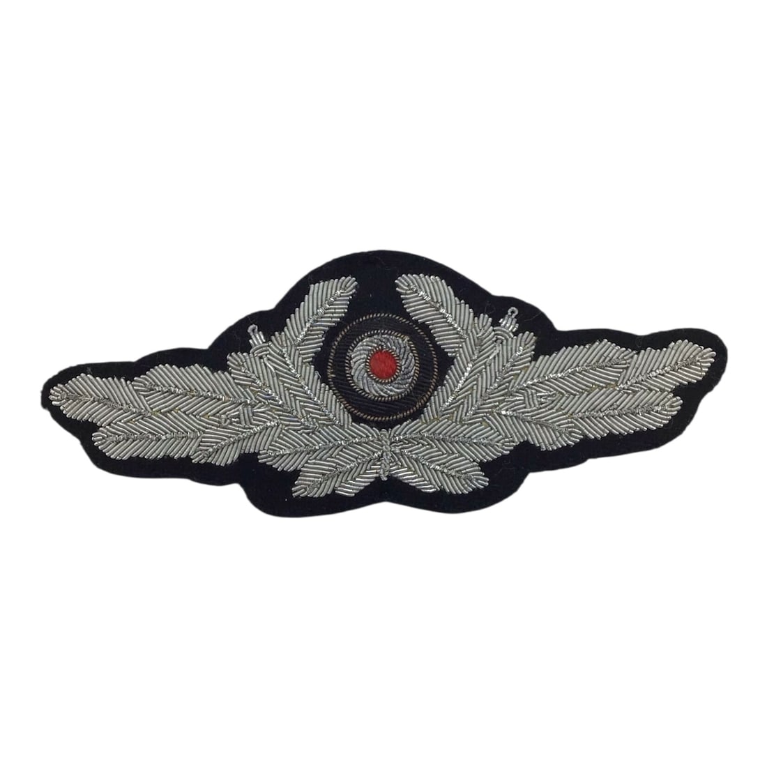 German Luftwaffe Officer's Visor Cap Wreath & Cockade | WW2: This German WWII Luftwaffe officer's visor cap wreath and cockade is a finely executed example of officer-grade headgear insignia. The wreath is hand embroidered in silver or aluminum bullion wire on