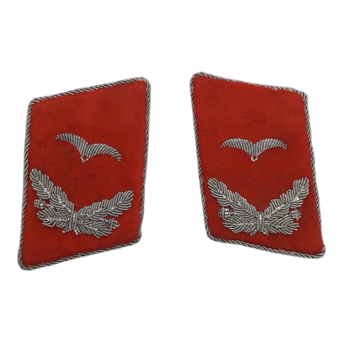 German WW2 Luftwaffe Flak Oberleutnant Collar Tabs - Red Artillery Branch: This original pair of German WWII Luftwaffe Flak Artillery Oberleutnant (First Lieutenant) collar tabs is a textbook example of Luftwaffe officer insignia, immediately distinguished by its red branch