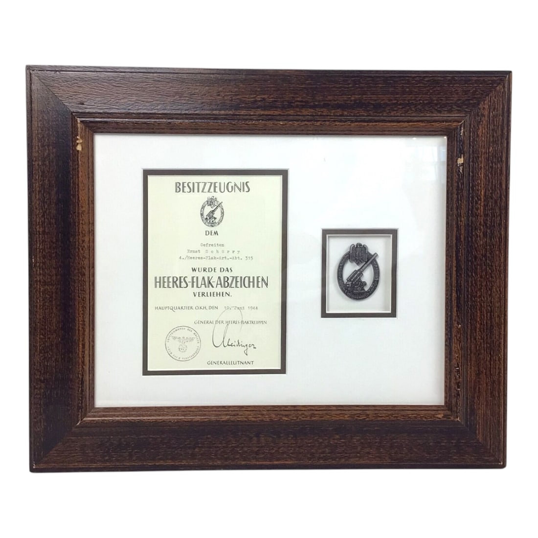 Wehrmacht Army Anti-Aircraft Flak Battle Badge Professionally Matted and Framed - German WW2: This Wehrmacht Army Flak Battle Badge, is awarded to Private Ernst Schorry of Heeres-Flak-Artillery Battalion 315 on June 10, 1944, and includes its original award document, signed by