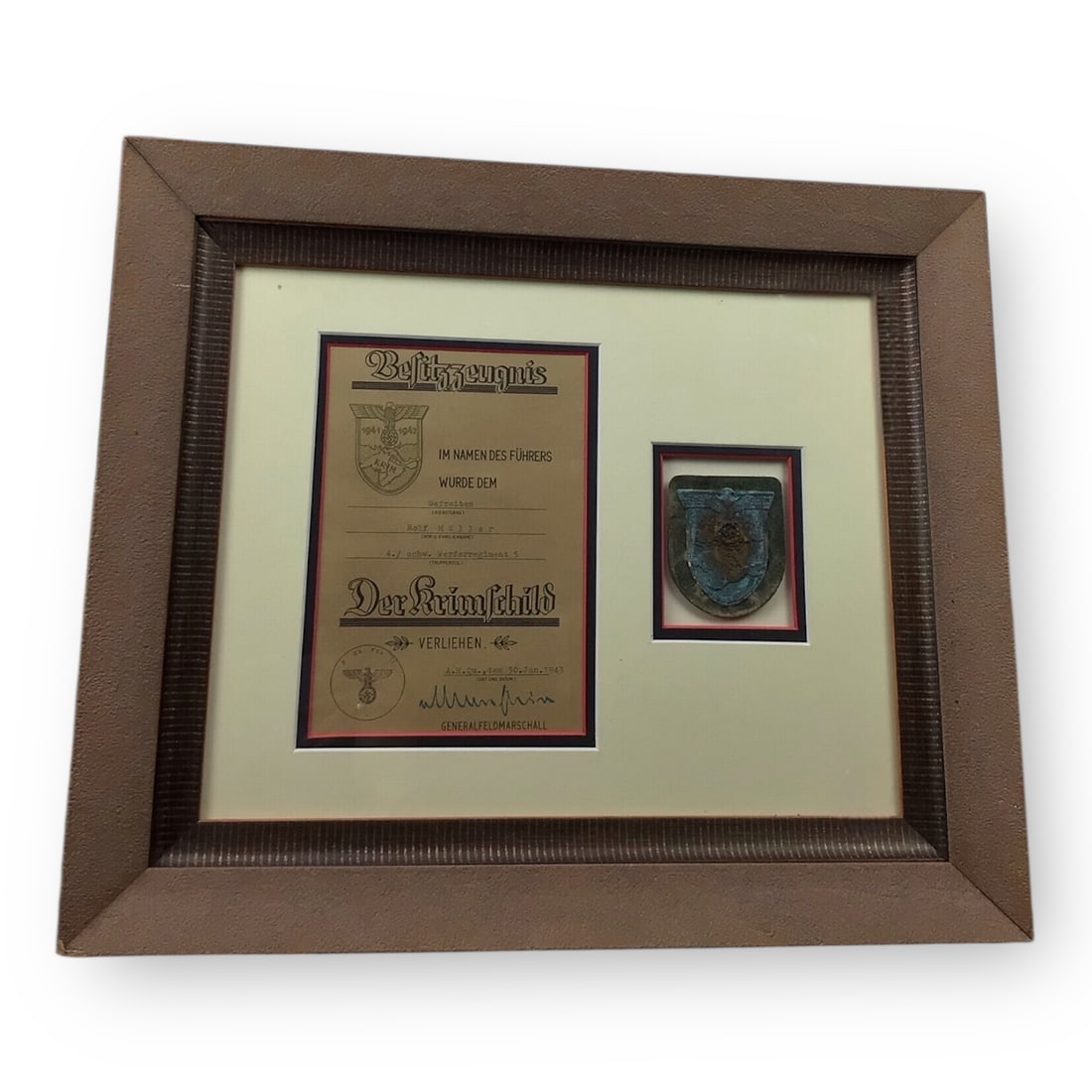 German WW2 Krim Shield with Award Doc Professionally Framed & Matted to Nebelwerfer Regiment! Rare!: This super rare display includes a genuine WWII-era Krim Shield awarded to a soldier of the Nebelwerfer Regiment, professionally framed with the original named award document. The shield shows authent
