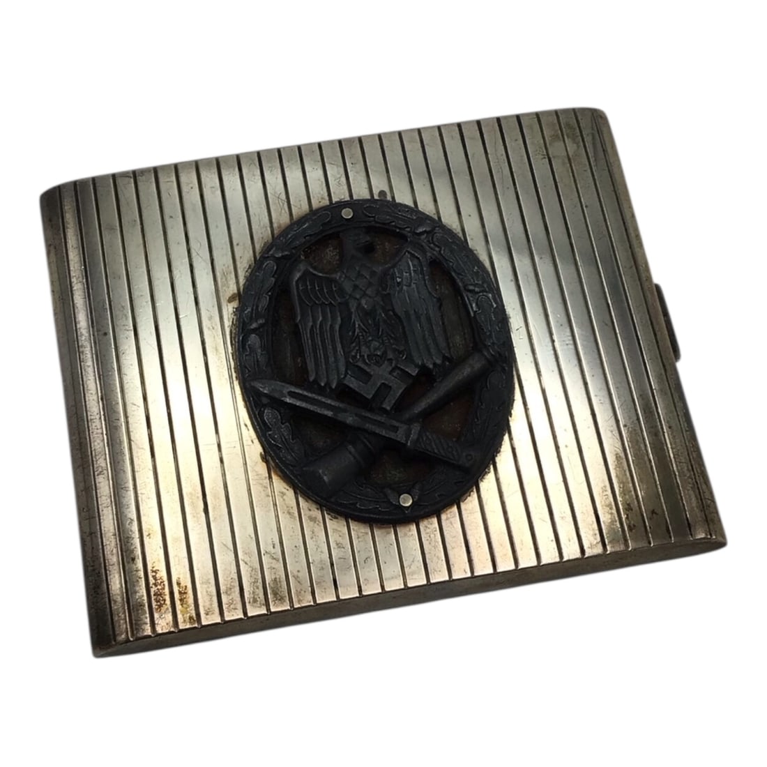 German Cigarette Case with Infantry Assault Badge / Marked! - Rare WW2 Era Case: This World War II-era German cigarette case features a machine-finished, Art Deco-style metal body with a solid, weighty construction and a tight, reliable clasp that remains fully functional. An infa