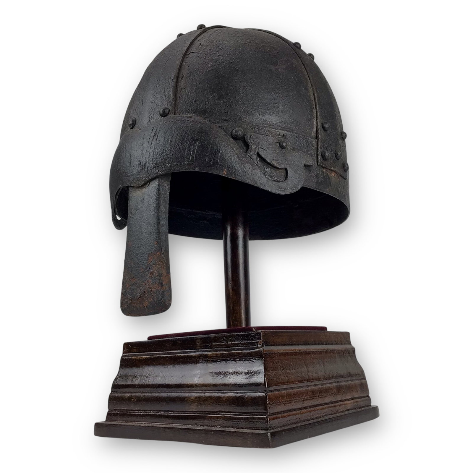 Rare Medieval Viking-to-Crusader Era Riveted Nasal Helmet with Stylized Deer Finials - 9th to 13th: A rare example of a heavy nasal helmet constructed from strong riveted iron plates and featuring a distinctive downturned nose guard and stylized deer head finials. The eyebrow-style brow plate adds a