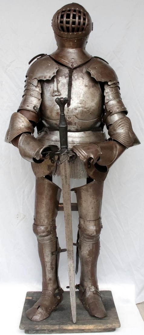 Victorian German Knight Suit of Armor with Rare Caged Visor Helmet & Stand: This highly presentable Victorian era suit of armor was created in the style of a 15th to 16th-century German knight and remains in very good condition. The armor is fully articulated and mounted on i
