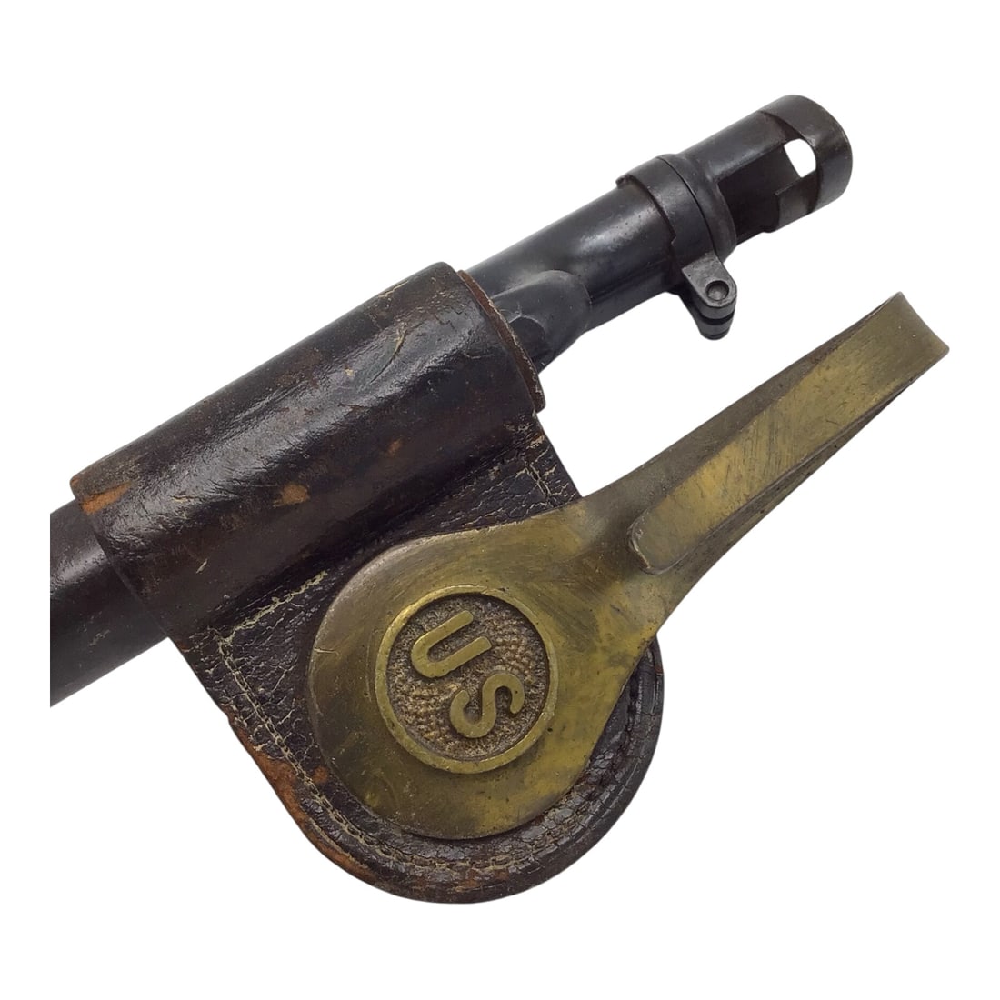U.S. Model 1873 Springfield Trapdoor Socket Bayonet with Brass Hook Scabbard: This U.S. Model 1873 socket bayonet was made for use with the U.S. Springfield “Trapdoor” rifle and is complete with its Model 1873 brass hook scabbard. The bayonet remains in good condition
