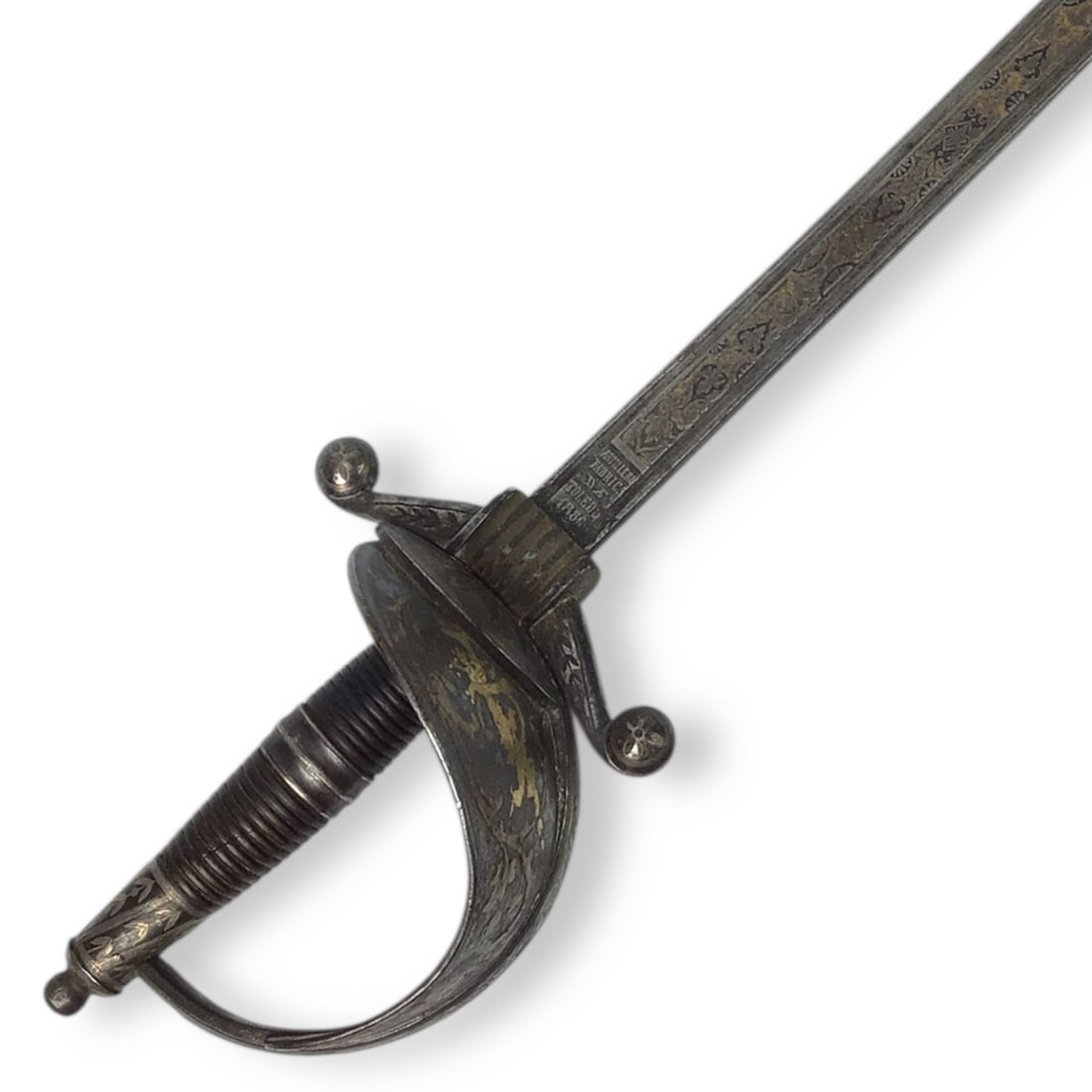 Magnificent Spanish or Mexican Senior Officer Sword with Ancestral Gilt Hilt and Toledo Blade circa: This Spanish or Mexican senior officer’s sword, dating to circa 1880, features a remarkable ancestral 18th century iron hilt that is heavily silvered and gold overlaid, richly decorated with