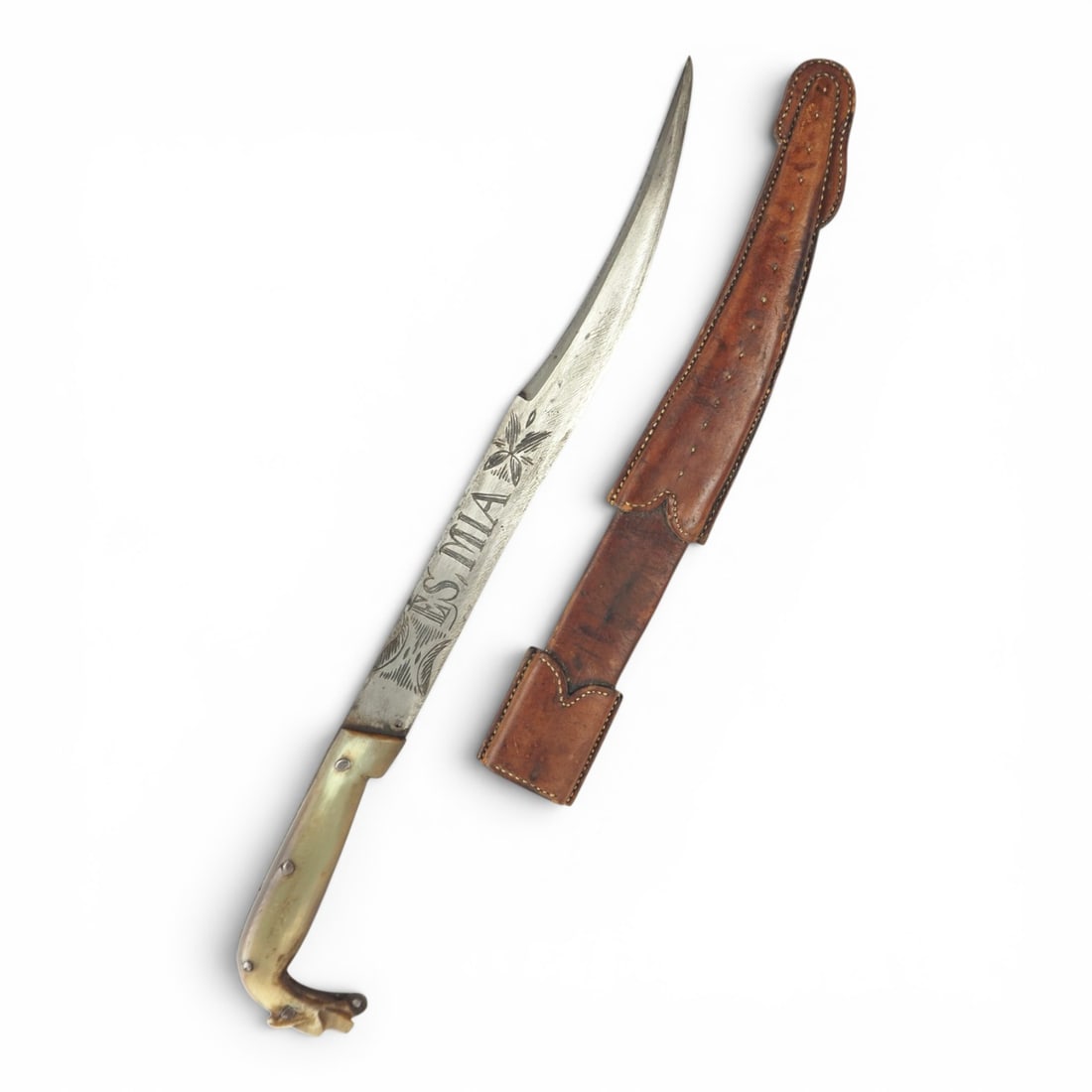 19th Century Mexican Dog Head Horn Handle Dagger Knife: This distinctive Mexican dagger-form knife, believed to be 19th century, features a narrow 12 1/4 inch clip-point blade with engraved inscriptions to both sides. One side is engraved Ayutla,