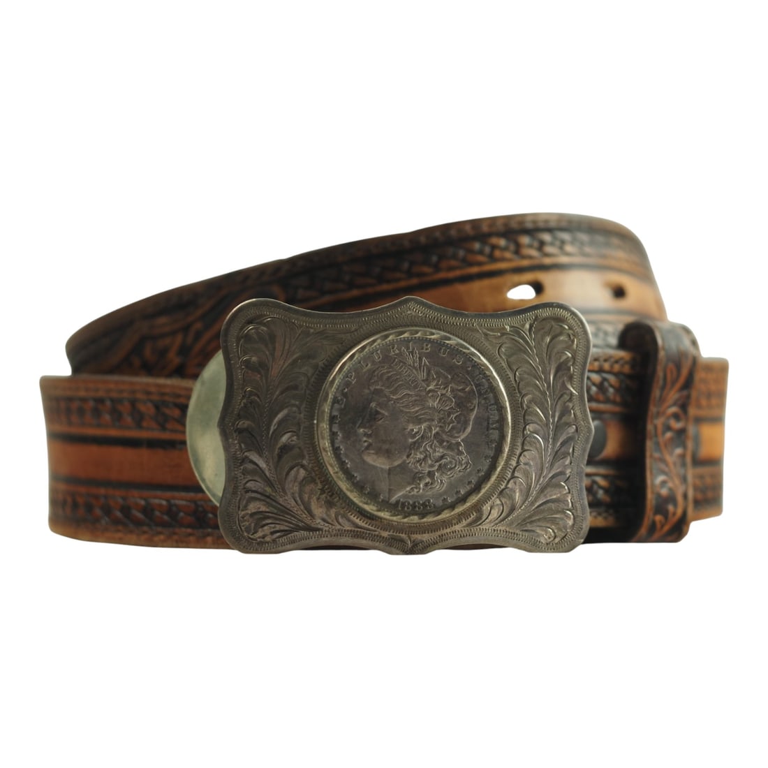 Tony Lama Belt with Sterling Silver Morgan Dollar Buckle by Silver State Silver Co.: This Western tooled leather Tony Lama belt is marked size 34 and fitted with a Silver State Silver Company sterling silver belt buckle featuring an original 1888 United States Morgan silve