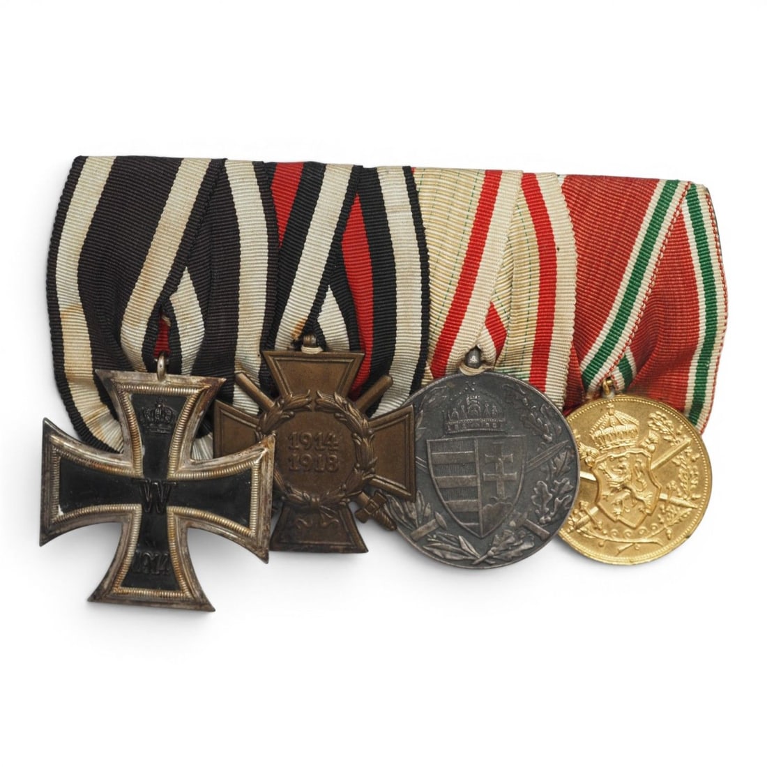 Imperial German & Austro-Hungarian WWI Four-Place Full Dress Medal Bar: This impressive Imperial German and Austro-Hungarian WWI four-place medal bar was assembled for full uniform dress occasions and features a strong multi-nation Great War award configuration. The bar c