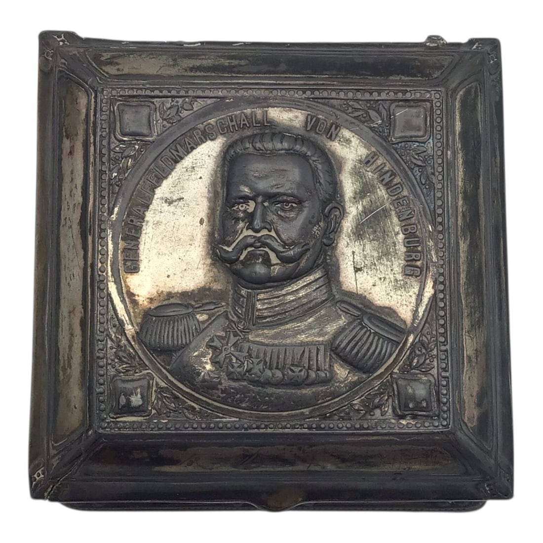 German WWI Iron Cross 2nd Class with Silver Hindenburg Presentation Box: This remarkable German World War I Iron Cross 2nd Class grouping consists of a finely preserved 1813/1914 Iron Cross housed within an exceptionally rare Prussian silver Hindenburg presentation box. Th