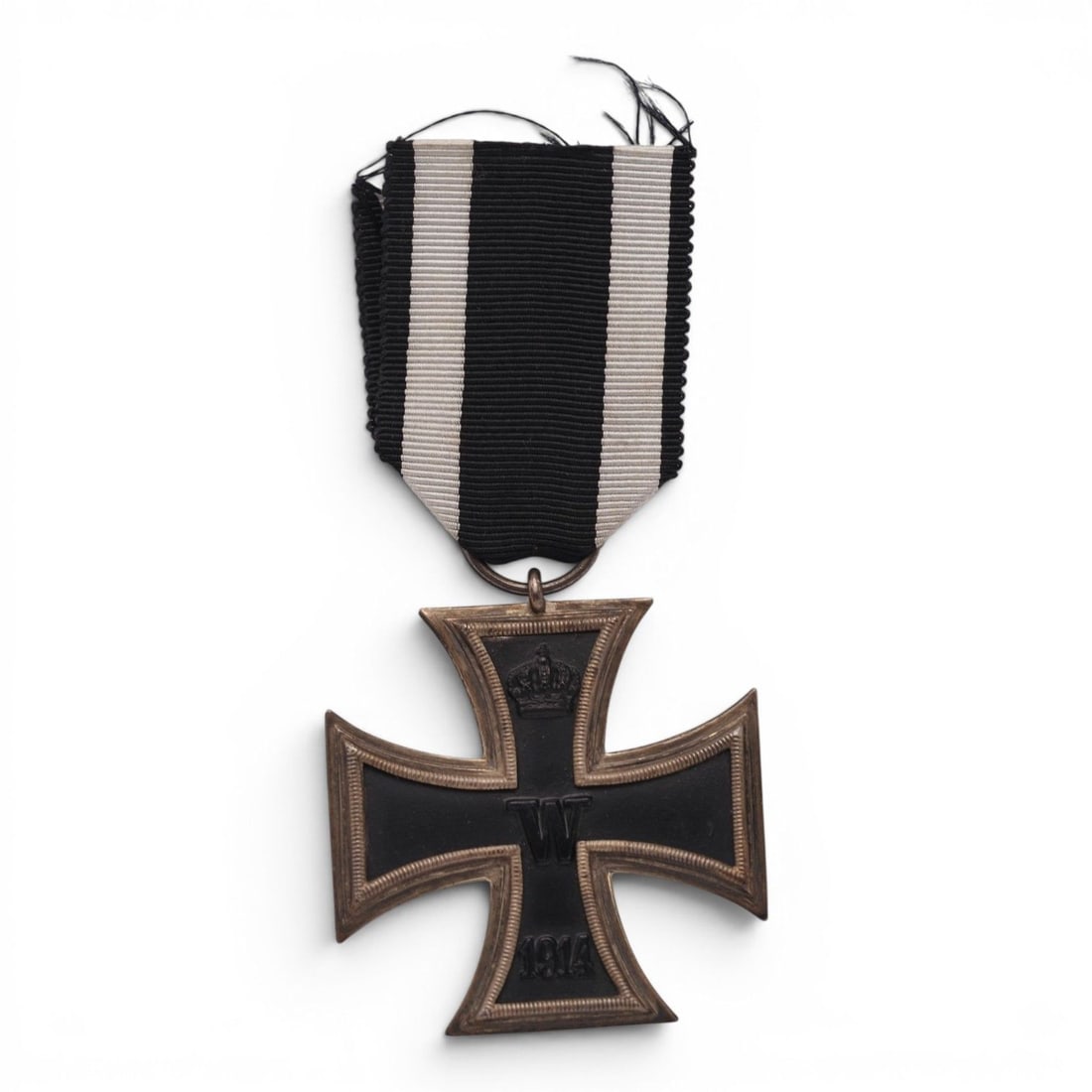 German WWI 1914 Iron Cross 2nd Class: This original German World War I 1914 Iron Cross 2nd Class is one of the most recognizable military decorations of Imperial Germany. The award represents the second class of the Iron Cross instituted 