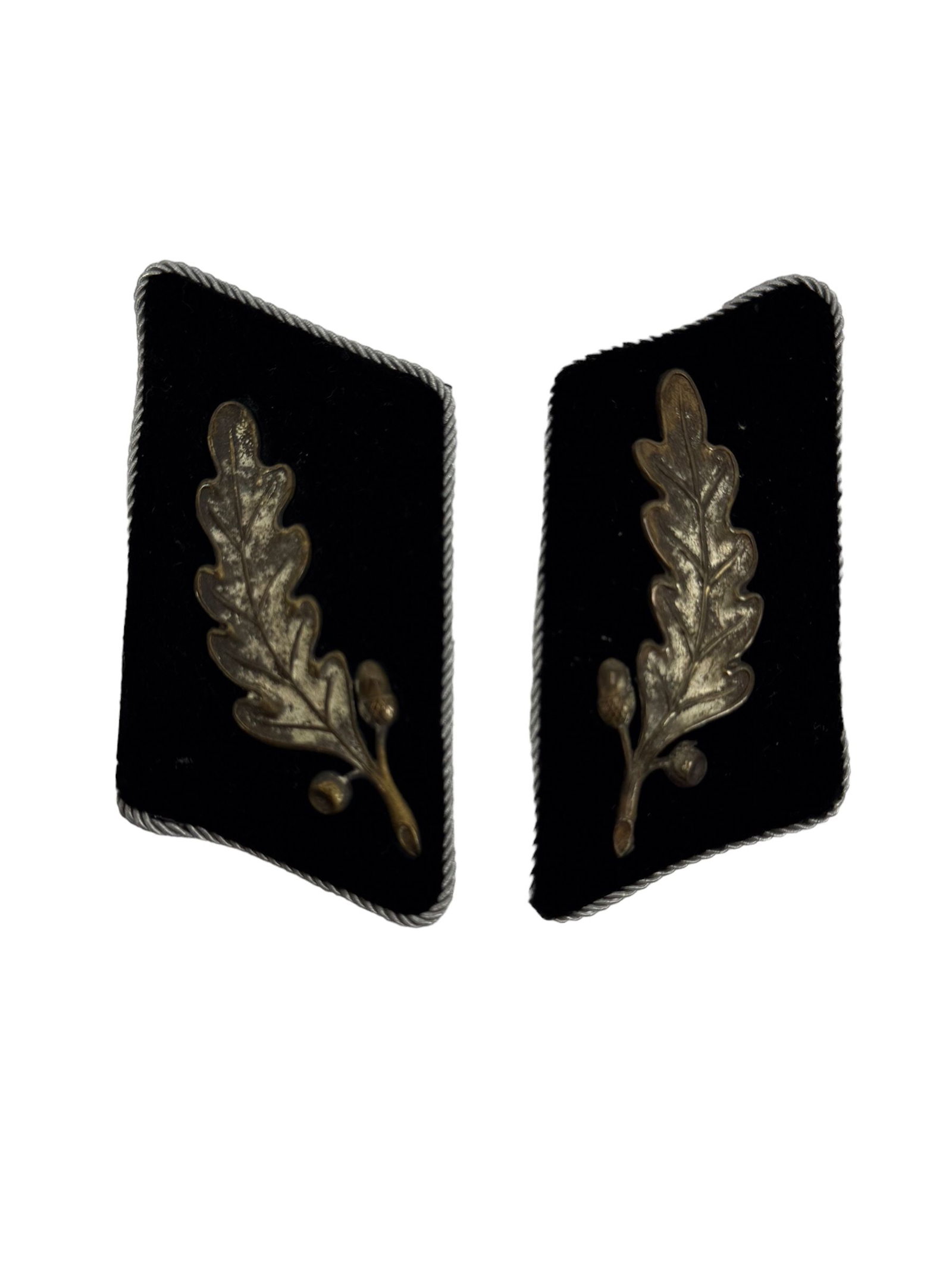RARE German WW2 SA Standartenfuhrer Collar Tabs pair for Senior Officer Paramilitary rank in Nazi: A rare and highly collectible pair of German WW2 SA-Standartenführer Collar Tabs, a prestigious piece of German WW2-era military regalia. These collar tabs, crafted from high-quality black wool, were