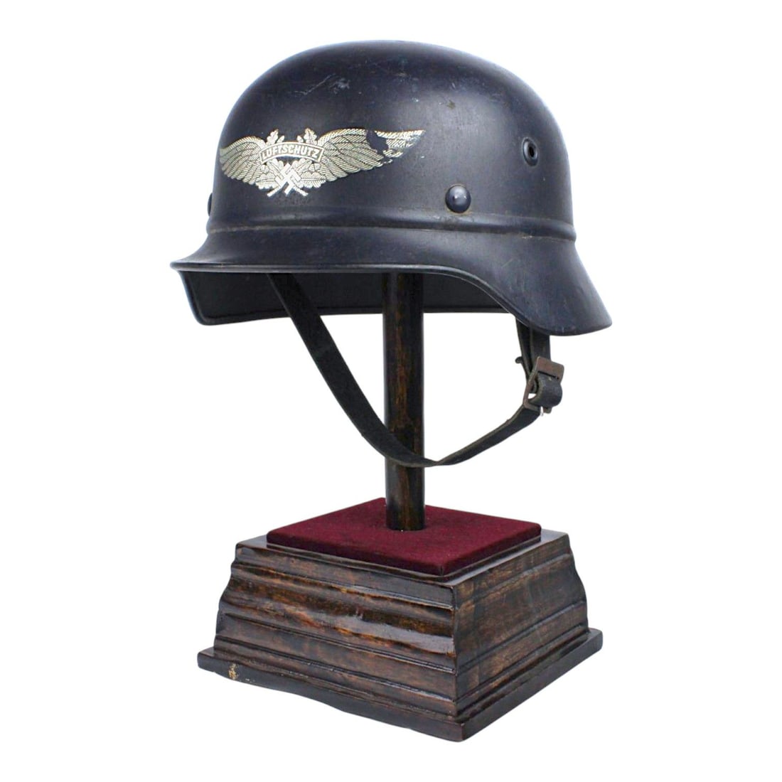 Fantastic German WW2 M40 Luftschutz Helmet Q66 with Complete Liner & Chinstrap: This outstanding German World War II M40 Luftschutz helmet is a remarkably complete example retaining its original Q66 shell stamp and lot number 31423 stamped at the rim. The helmet is fitted wit