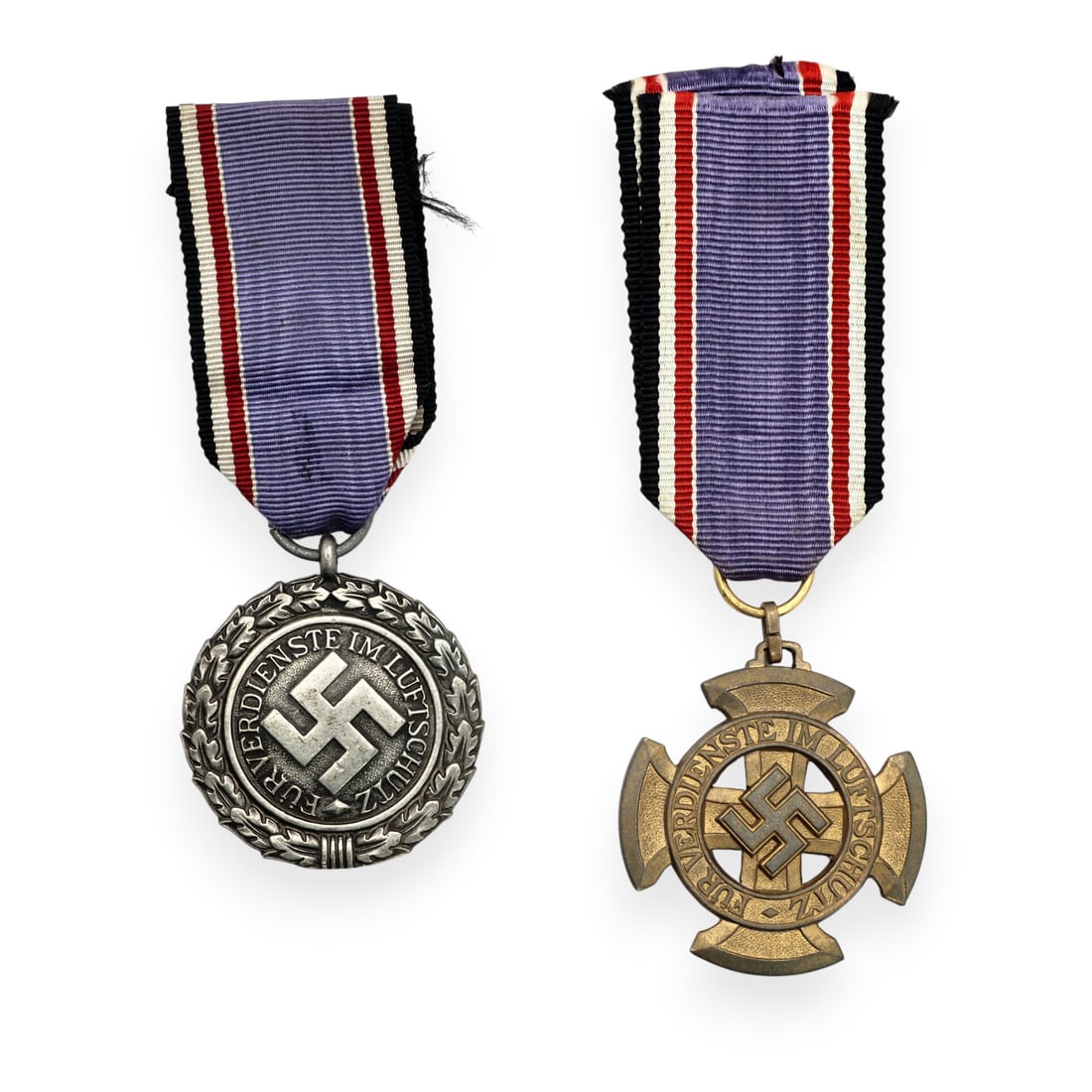 Rare German WW2 Luftschutz Civil Defense Decoration 1st & 2nd Class Medal Set, 1938: This outstanding German World War II Luftschutz Civil Air Defense Honor Decoration collection includes both the rare 1st Class Luftschutz Honor Decoration dated 1938 with ribbon and the 2n