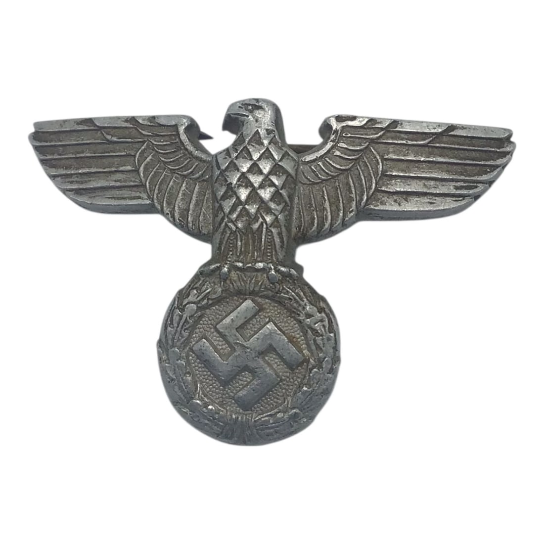 German WWII NSDAP 1939 Pattern SA Political Advisor Visor Cap Eagle: This original German WWII NSDAP 1939 Pattern visor cap eagle is a well-preserved example of political and paramilitary insignia worn by members of the SA, or Sturmabteilung, and NSDAP political leader