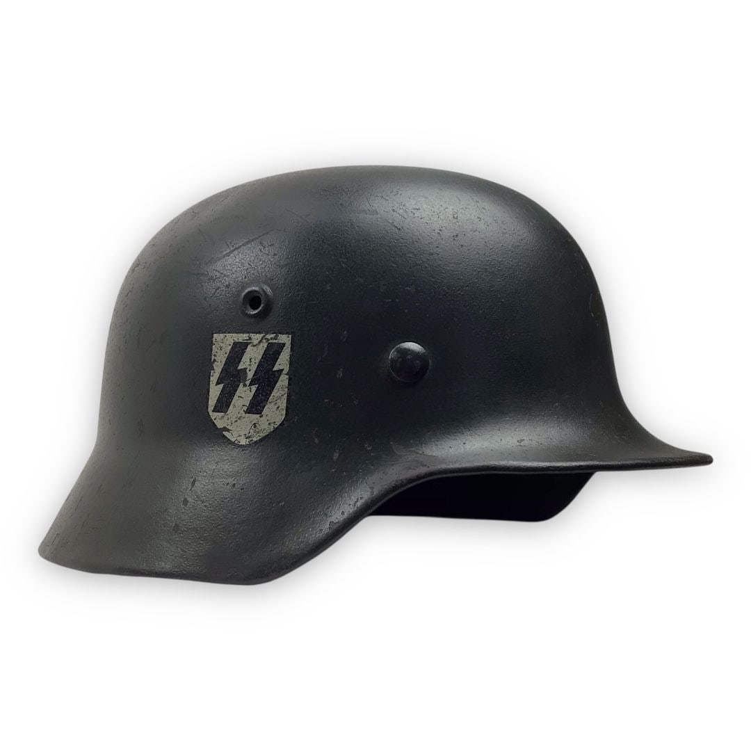 Exceptionally Rare German WW2 Waffen-SS M1935 Single Decal Combat Helmet - Named: This appears to be a rare WWII-era Waffen-SS M1935 combat helmet, believed to retain much of its wartime configuration and attributed to “Peter Spiller”. The helmet features a combat-sized
