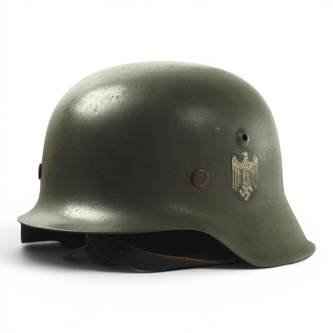 German WWII M42 Heer Single Decal Helmet, Lot 3857, 98% Paint & Decal: This exceptional German WWII M42 Army Heer single decal helmet is marked with lot number 3857 and represents a remarkably well-preserved example of one of the Wehrmacht's most iconic combat helmets. T