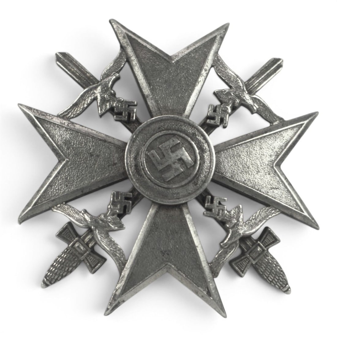 WW2 German Spanish Cross in Silver with Swords maker marked "CEJ" for CE Juncker Berlin: This German WWII Spanish Cross in Silver with Swords is maker marked CEJ for C.E. Juncker of Berlin and marked 900 for silver grade. The award exhibits crisp detail to the vaulted