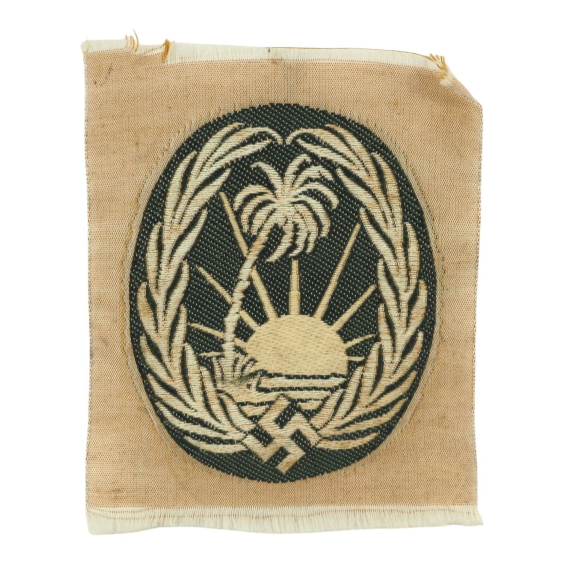 German WW2 Afrika Korps Sleeve Cloth Insignia: This original German WWII Afrika Korps sleeve cloth insignia is a desirable uniform component associated with German forces serving in North Africa. The insignia would have been worn on the sleeve of 