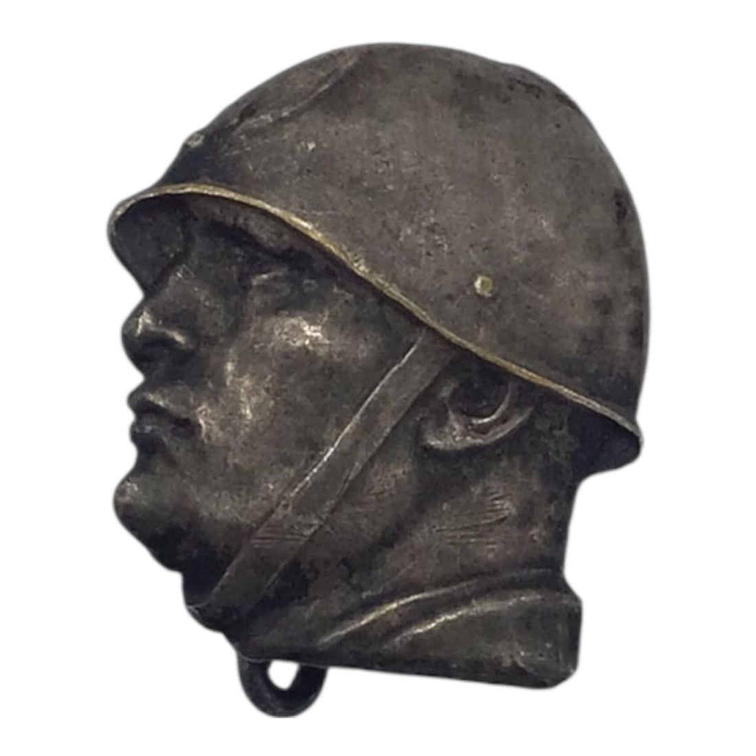 Italian WW2 Fascist Mussolini Lapel Badge: This Italian WWII Fascist Mussolini lapel badge is a small but historically direct piece of political insignia from Fascist Italy. Intended for wear on civilian or organizational dress, the badge refl