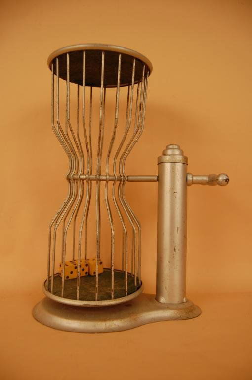 Antique bartop chuck-a-luck dice cage: Antique bartop chuck-a-luck dice cage with three wooden dice. Felt lined ends and 85% original silver paint. About 12" high.