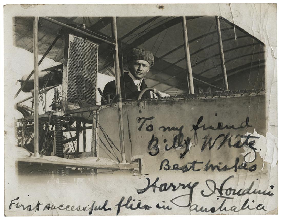 Inscribed and Signed Photograph of Houdini Piloting his (1 of 1)