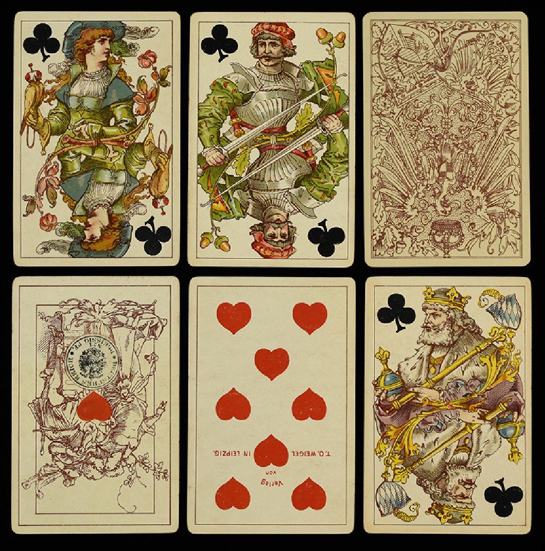 F.X. Schmidt Art Nouveau Heraldic Designs for T.O.: F.X. Schmidt Art Nouveau Heraldic Designs for T.O. Weigel. Leipzig, ca. 1880. 32/32, excellent. Deck designed by E. Doepler Jr., Weigel name on 10H and tax stamp on AH.