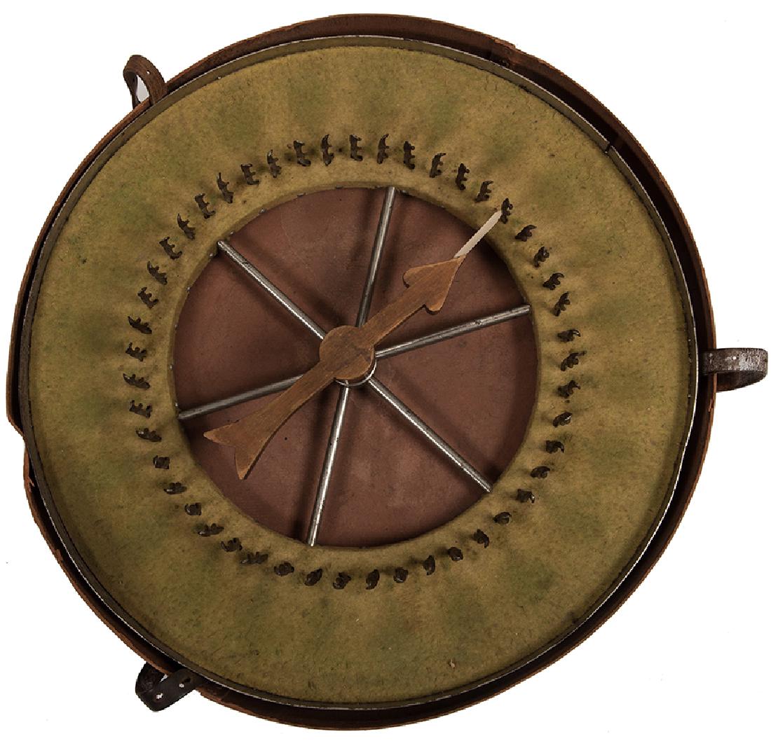 Gaffed Silver Wheel Spindle Game. (1 of 2)