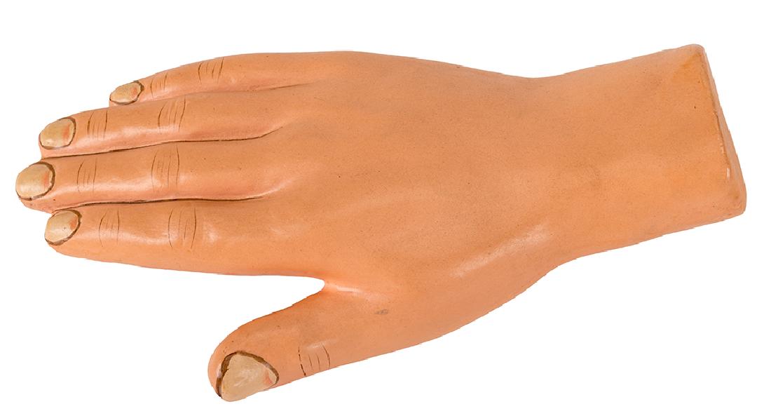 Spirit Rapping Hand.: Spirit Rapping Hand. London: Davenport’s, ca. 1920. Papier-mache model hand (approx. 6” long) mysteriously raps out answers when placed on a pane of glass. Hand painted.