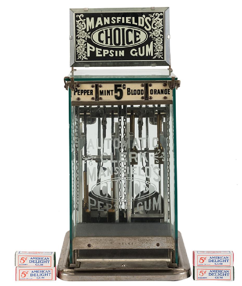 Automatic Clerk Co. 5 Cent Two Column Mansfield Gum: Automatic Clerk Co. 5 Cent Two Column Mansfield Gum Vendor. Newark, N.J., ca. 1902. Drop a nickel in and out comes a package of gum as the bell rings. Reproduction marquee and packs of gum. Lock and k