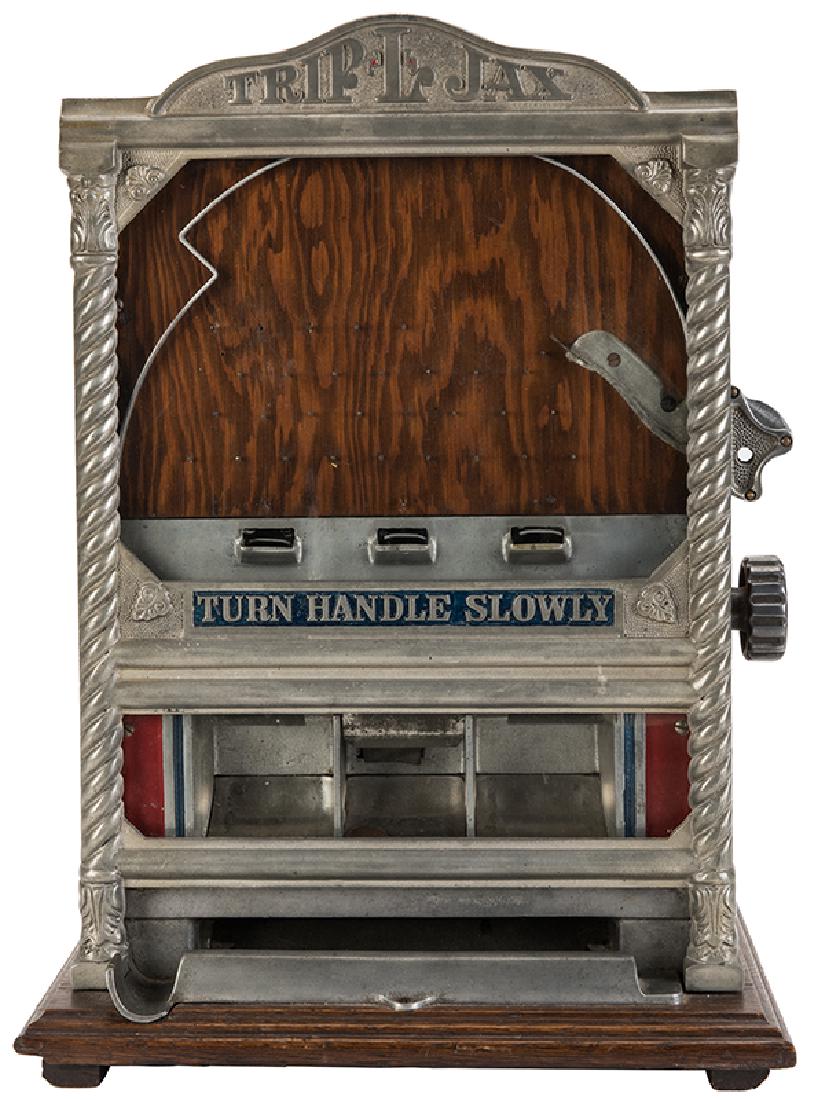 A.B.T. Manufacturing Company 1 Cent Trip-L-Jax Machine.: A.B.T. Manufacturing Company 1 Cent Trip-L-Jax Machine. Chicago, ca. 1930. Flip a penny into one of three pockets, turn the handle and collect all the pennies in that pocket. Aluminum and wood. Origin