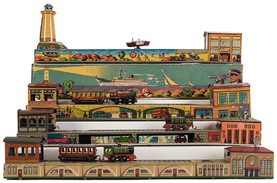 Lot of Four Wind-Up Tin Litho Transportation Toys. (1 of 1)