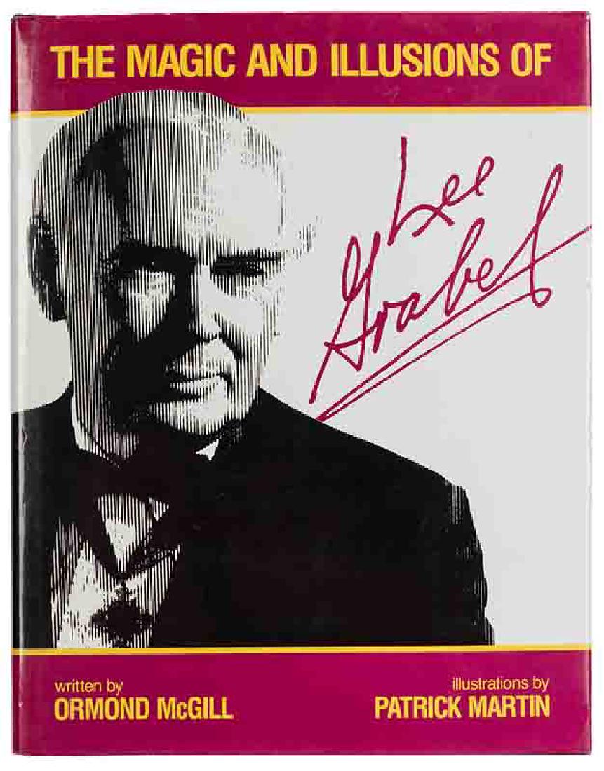 The Magic and Illusions of Lee Grabel.: McGill, Ormond. The Magic and Illusions of Lee Grabel. Enchantus, 1986. Autographed first edition, number 464, signed by Grabel on the limitation page. Maroon leatherette stamped in gilt, dust-jacket.