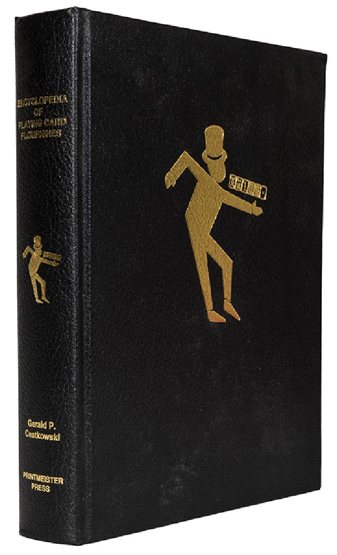 Encyclopedia of Playing Card Flourishes.: Cestkowski, Gerald. Encyclopedia of Playing Card Flourishes. Denver, 2002. Publisher’s black buckram stamped in gilt. Illustrated. 4to. Fine.