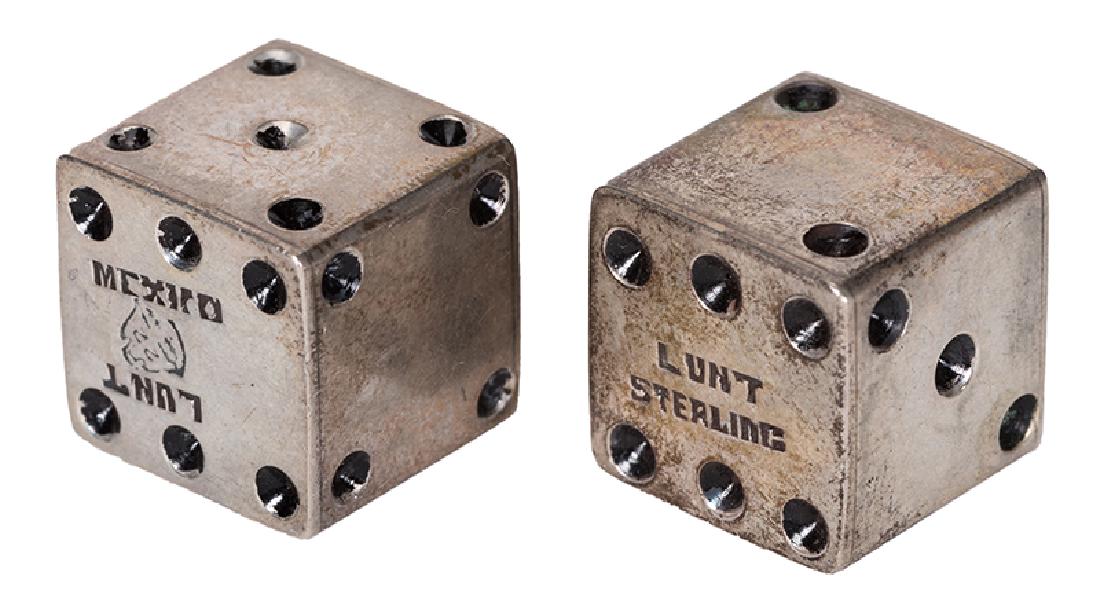 Pair of Sterling Silver Lunt Dice.: Pair of Sterling Silver Lunt Dice. Mexico, ca. 1940s. Finely crafted pair of dice, both hallmarked by the manufacturer. Each one-half inch square, combined weight approx. one-half of an ounce.