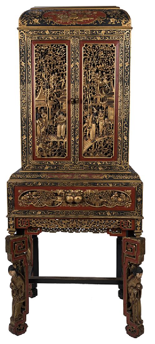 A Large and Ornately Carved Chinese Cabinet on Stand. (1 of 4)