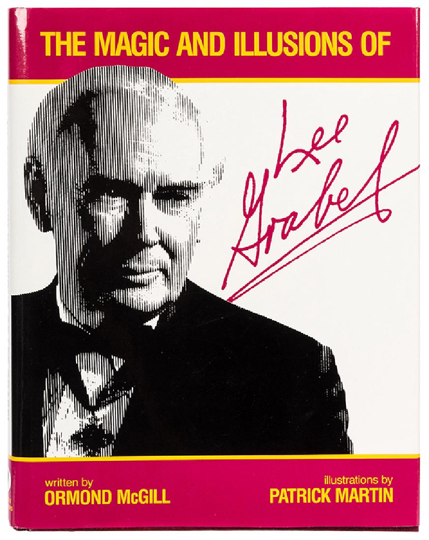 The Magic and Illusion of Lee Grabel.: McGill, Ormond. The Magic and Illusion of Lee Grabel. Enchantus, 1986. Autographed first edition, numbered 904, inscribed to Julie (Mulkey) and signed by Grabel on the limitation page. Pebbled vinyl h