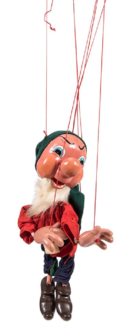 Snow White and the Seven Dwarves Pelham Puppet Set.: Snow White and the Seven Dwarves Pelham Puppet Set. England, ca. 1950s. Officially licensed by the Walt Disney Company, finely executed large figures of Snow White and the Dwarves (Bashful, Doc, Dopey