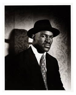 Evander Holyfield Portrait by Len Prince.: . Evander Holyfield Portrait by Len Prince. Circa 1997. Silver gelatin print. 20 x 16”. Paper slightly wavy, with creases to corners, otherwise fine. Obtained directly from the photographer by the c