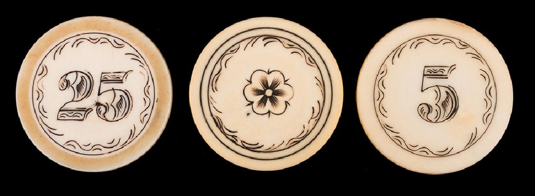 Set of Three Scrimshawed Poker Chips.: Set of Three Scrimshawed Poker Chips. American, ca. 1890. Includes: Flower, $5 and $25. 1 1/2". No cracks or nerve holes.