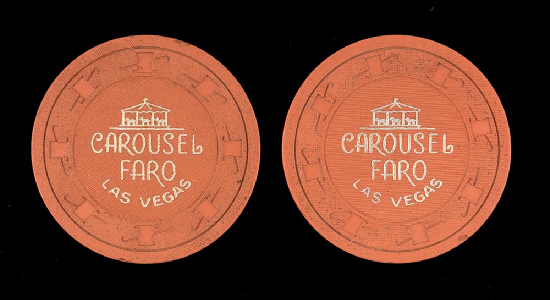 Two Carousel Faro Chips.: Two Carousel Faro Chips. Las Vegas, ca. 1965. Orange. Minor edge nicks otherwise excellent.