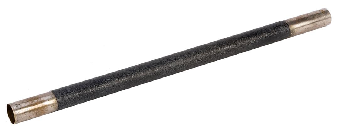 Coin Wand.: Coin Wand. Hamburg: Janos Bartl, ca. 1940. Coins appear at the tip of the metal wand at the magicianÕs command. Bartl palming coin gimmick. Tarnishing; very good.