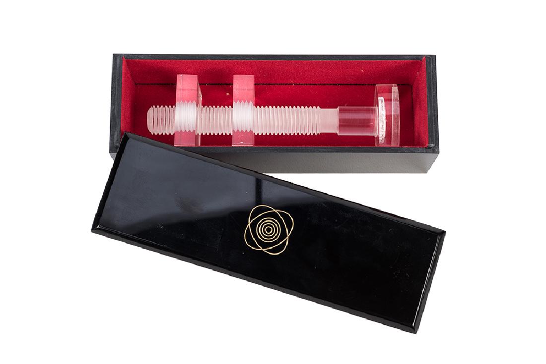 Nut and Bolt.: Nut and Bolt. Leiden, Holland: Anverdi, ca. 1975. A giant clear acrylic bolt and nut threaded together are placed in a black box. When the box is reopened, the nut and bolt have separated. Near fine.